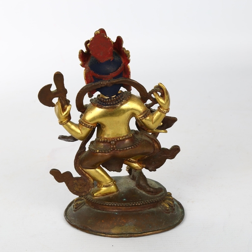 1113 - An Indian bronze figure of Ganesh, parcel gilt and painted decoration, height 16cm