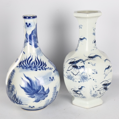 1127 - 2 Chinese blue and white porcelain vases, decorated with crayfish and carp, height 36cm