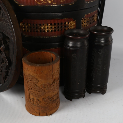 1128 - A Chinese lacquer drum-shaped food container, height 40cm, and 4 other carved wood items