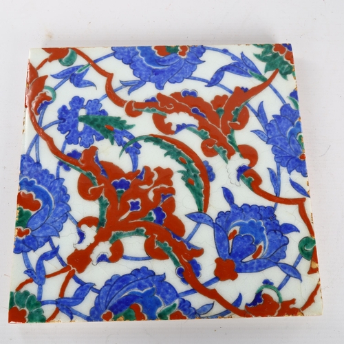 1142 - A Middle Eastern Iznik pottery tile, 25cm x 25cm