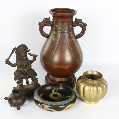 1156 - A group of Chinese metalware, including a bronze and champleve enamel 2-handled vase, on hardwood st... 