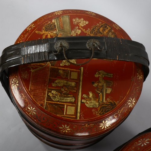 1166 - A large pair of Chinese gilded and lacquered sectional food carriers, in bentwood frame, diameter 43... 