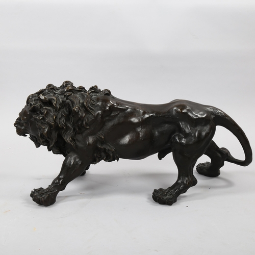 1170 - Patinated bronze sculpture, snarling lion, length 60cm, reprodution