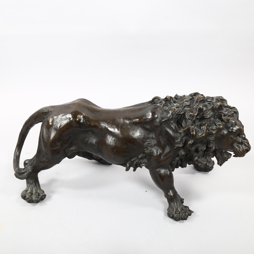 1170 - Patinated bronze sculpture, snarling lion, length 60cm, reprodution