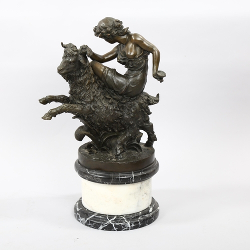 1173 - Patinated bronze sculpture, Classical woman riding a ram, mounted on two-colour marble base, height ... 