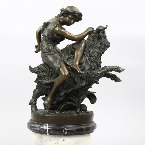 1173 - Patinated bronze sculpture, Classical woman riding a ram, mounted on two-colour marble base, height ... 