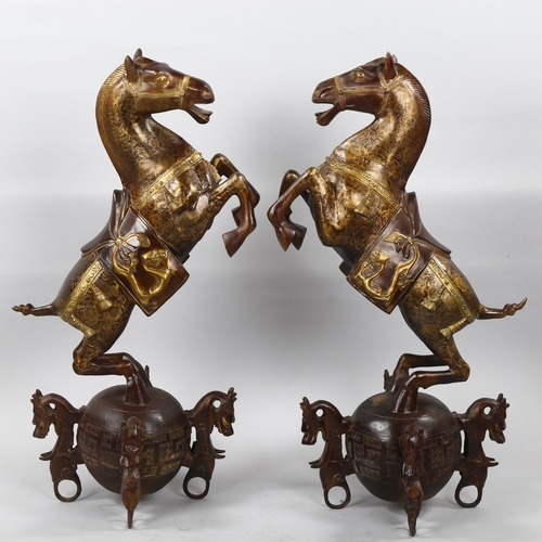 1183 - Pair of Chinese parcel-gilt bronze rearing horses, height 73cm, reproduction