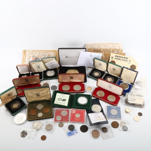 1186 - A collection of Channel Island, British and other coins including some silver proof coins