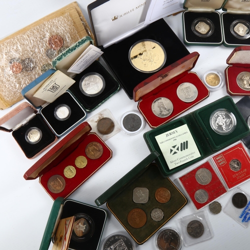 1186 - A collection of Channel Island, British and other coins including some silver proof coins