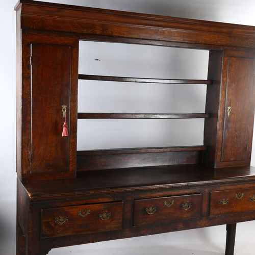 1190 - An 18th century 2 section oak dresser with open plate rack and 3 drawer base, 184 x 188 x 46cm