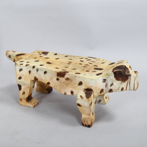 2054 - Gerard Rigot (born 19290, carved and painted wood sculpture of a dog, signed underneath, length 49cm