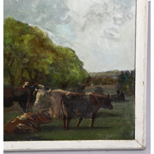 2121 - Early 20th century oil on canvas, cattle in meadow, signed with monogram, 35cm x 40cm, framed