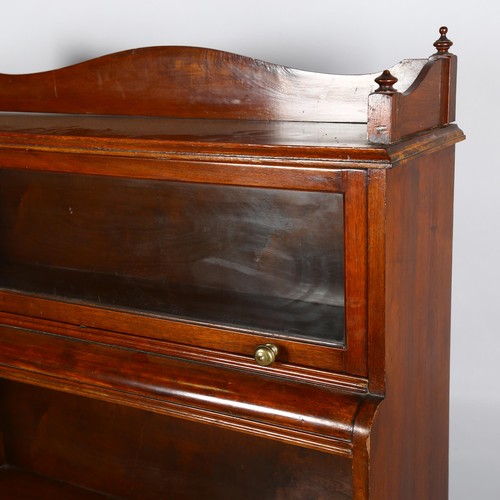 1027 - A Victorian mahogany bookcase with glazed cabinet above, width 103cm, height 135cm