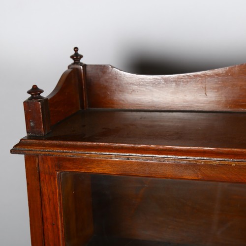 1027 - A Victorian mahogany bookcase with glazed cabinet above, width 103cm, height 135cm