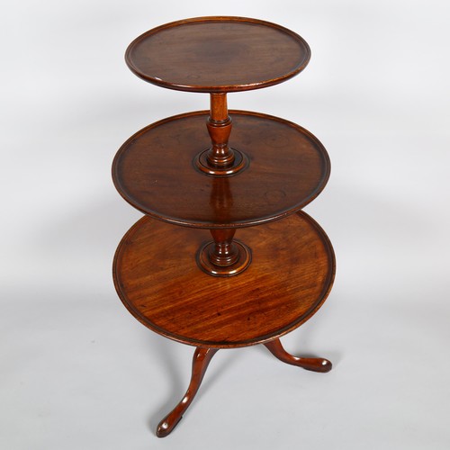 1028 - A George III circular mahogany 3-tier dumb waiter on tripod base, height 110cm, lower tier diameter ... 