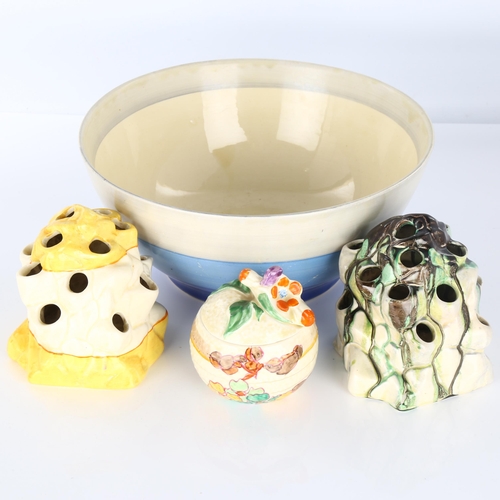 1165 - A Clarice Cliff Bizarre fruit bowl, retailed by Liberty's, diameter 22cm, 2 Clarice Cliff flower arr... 