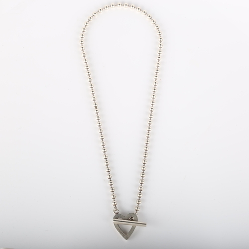 103 - GUCCI - an Italian sterling silver heart toggle necklace, with ball links, necklace length 36cm, 22.... 