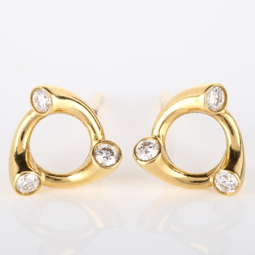 105 - GEORG JENSEN - a pair of 18ct gold diamond Magic earrings, set with modern round brilliant-cut diamo... 