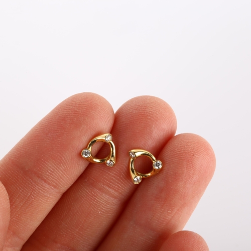 105 - GEORG JENSEN - a pair of 18ct gold diamond Magic earrings, set with modern round brilliant-cut diamo... 