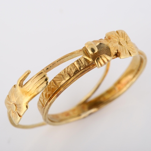 108 - A 19th century Fede and triple hoop Gimmel ring, unmarked gold settings composed of 3 conjoined hoop... 