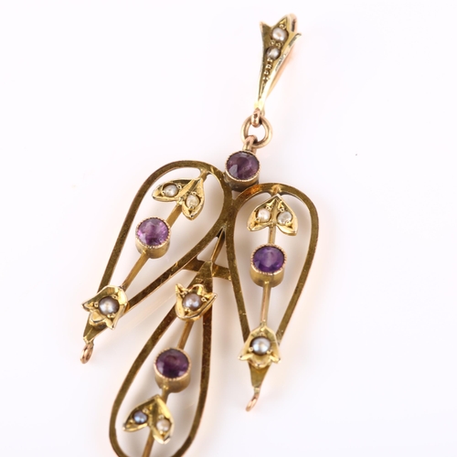 116 - An Edwardian 9ct gold amethyst and pearl angel openwork pendant, set with round-cut amethyst and spl... 