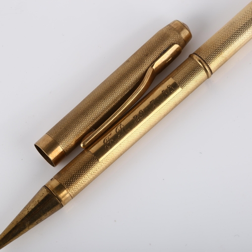 130 - A mid-20th century 9ct gold combination propelling pencil/ballpoint pen, engine turned case with 9ct... 