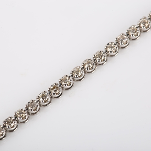 131 - A modern 18ct white gold diamond tennis line bracelet, set with modern round brilliant-cut diamonds,... 