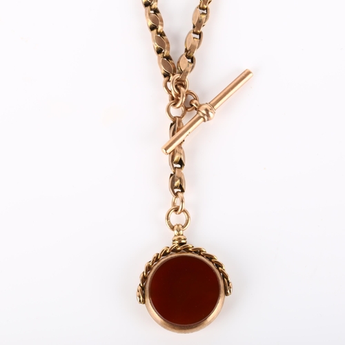 135 - An Antique 9ct rose gold fancy link Albert chain necklace, with 9ct hardstone swivel fob, T-bar and ... 