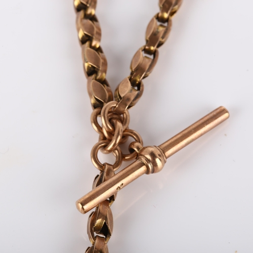 135 - An Antique 9ct rose gold fancy link Albert chain necklace, with 9ct hardstone swivel fob, T-bar and ... 