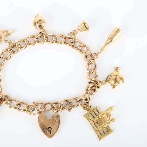 136 - A mid-20th century 9ct gold hollow curb link charm bracelet, with 8 gold charms and heart padlock cl... 