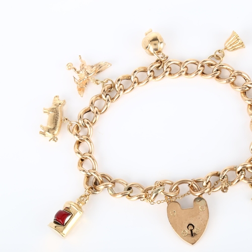 136 - A mid-20th century 9ct gold hollow curb link charm bracelet, with 8 gold charms and heart padlock cl... 