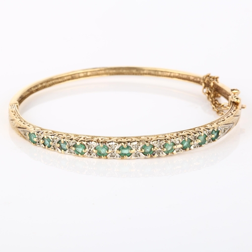 140 - A 9ct gold emerald and diamond hinged bangle, set with round-cut emerald and single-cut diamonds, ba... 