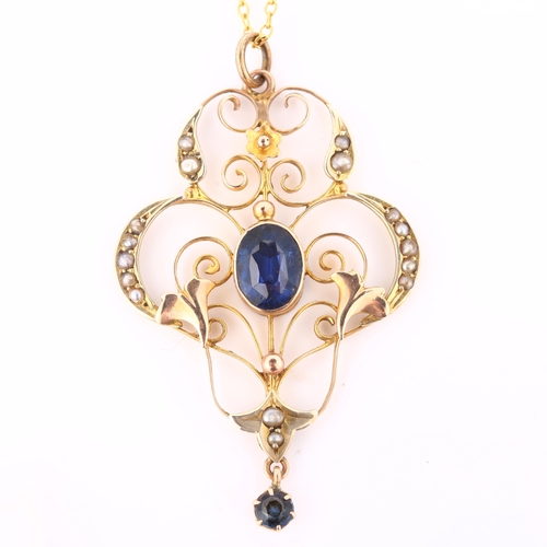 150 - An Edwardian Art Nouveau 9ct gold stone set openwork pendant necklace, set with oval mixed-cut synth... 