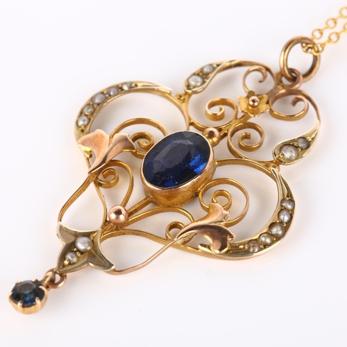 150 - An Edwardian Art Nouveau 9ct gold stone set openwork pendant necklace, set with oval mixed-cut synth... 