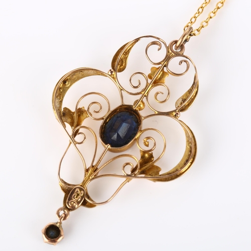 150 - An Edwardian Art Nouveau 9ct gold stone set openwork pendant necklace, set with oval mixed-cut synth... 