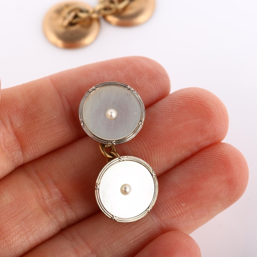 155 - A pair of Art Deco 9ct rose gold mother-of-pearl cufflinks, circular panels with central split pearl... 