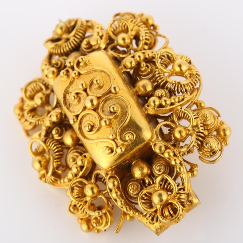 156 - A  Victorian Etruscan Revival brooch, unmarked gold settings with cannetille decoration, brooch leng... 