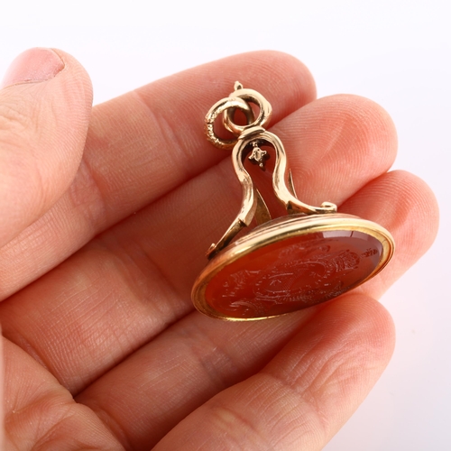 161 - A large Victorian armorial seal fob, intaglio carved carnelian with Order Of The Bath motto 