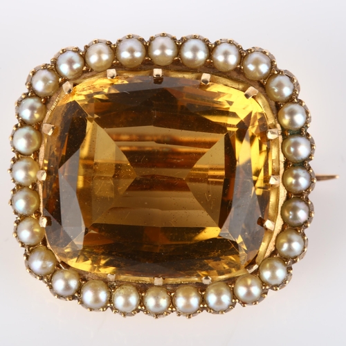 165 - A 19th century citrine and pearl cluster brooch, unmarked gold settings with cushion-cut citrine and... 