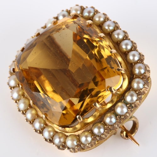 165 - A 19th century citrine and pearl cluster brooch, unmarked gold settings with cushion-cut citrine and... 