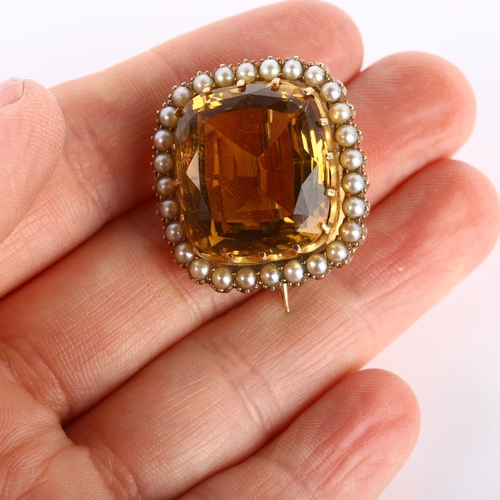 165 - A 19th century citrine and pearl cluster brooch, unmarked gold settings with cushion-cut citrine and... 