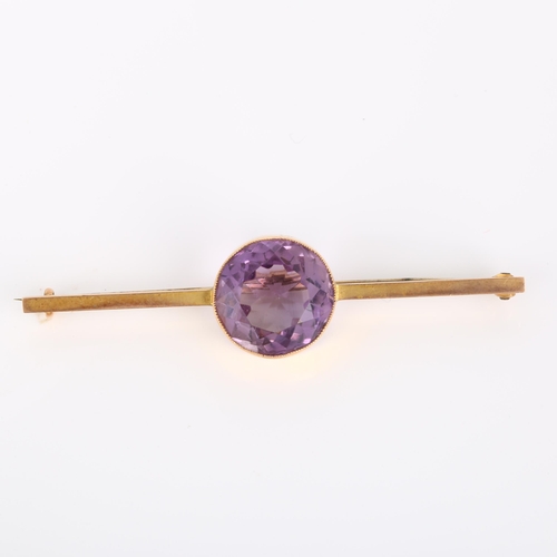 169 - A 19th century 9ct gold amethyst bar brooch, set with large round-cut amethyst, amethyst measures 14... 