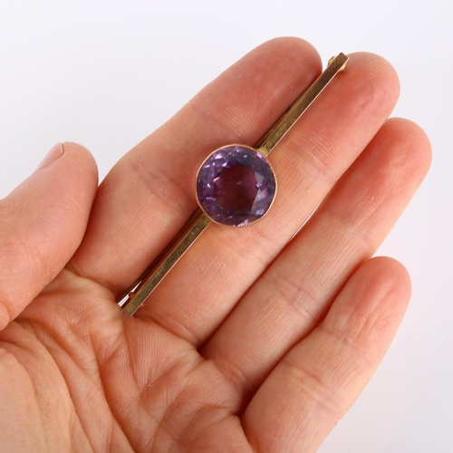 169 - A 19th century 9ct gold amethyst bar brooch, set with large round-cut amethyst, amethyst measures 14... 