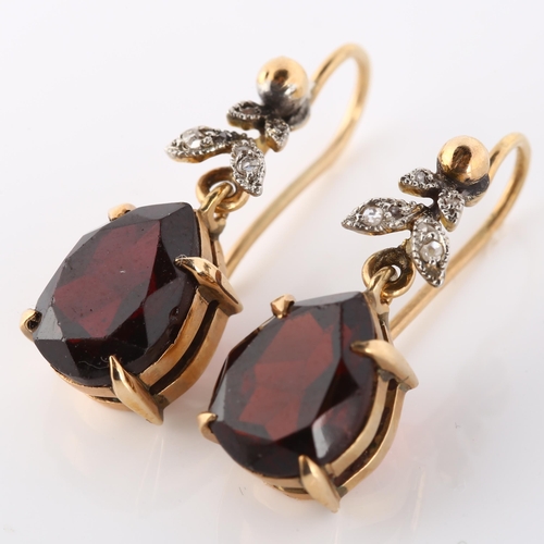 170 - A pair of early 20th century garnet and diamond drop earrings, unmarked gold settings with pear-cut ... 