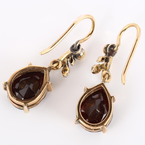 170 - A pair of early 20th century garnet and diamond drop earrings, unmarked gold settings with pear-cut ... 