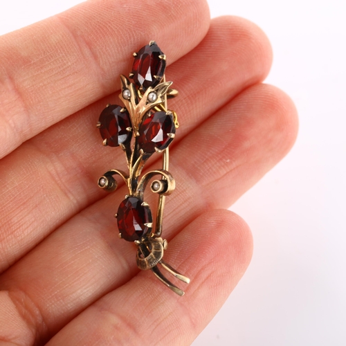 171 - A mid-20th century garnet and pearl floral spray brooch, unmarked gold settings, length 42mm, 4.1g