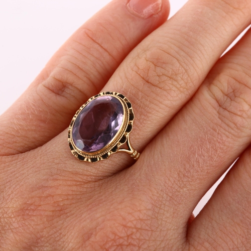 175 - A late 20th century 9ct gold amethyst dress ring, set with oval mixed-cut amethyst, hallmarks London... 