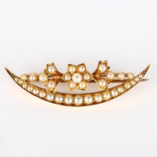 177 - A Victorian split pearl flowerhead crescent brooch, unmarked gold settings, brooch length 39.6mm, 4.... 