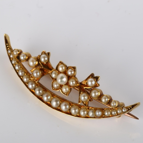 177 - A Victorian split pearl flowerhead crescent brooch, unmarked gold settings, brooch length 39.6mm, 4.... 