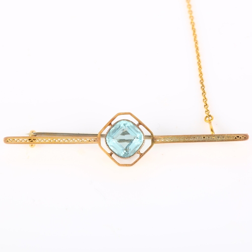 182 - An Art Deco 9ct gold blue topaz bar brooch, pierced openwork decoration, brooch length 63.6mm, 4g